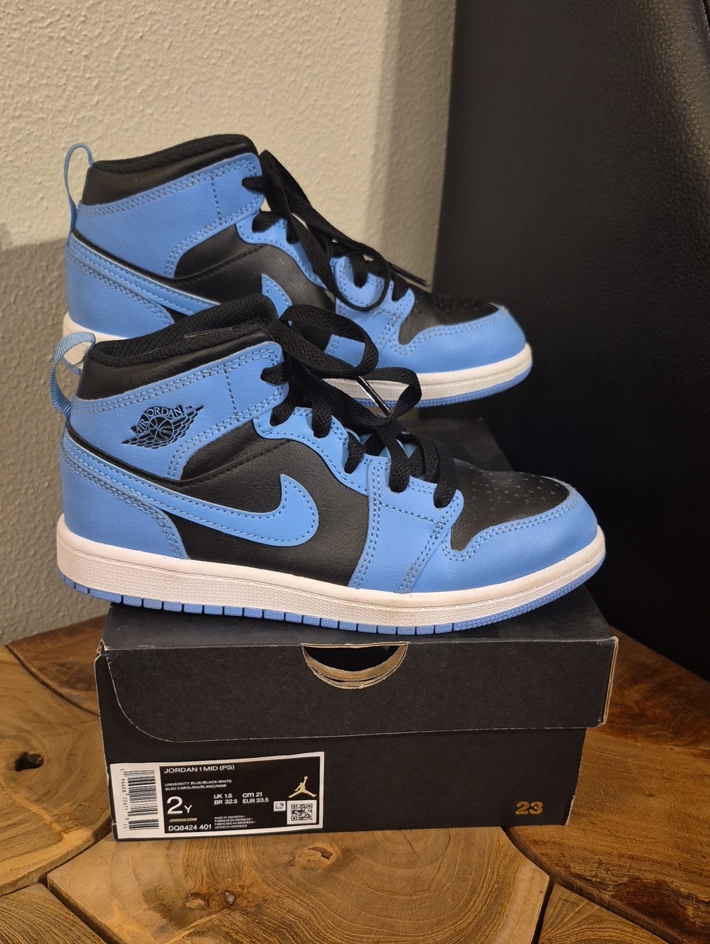 Jordan Kids Mid-Top Sneakers in University Blue and Black